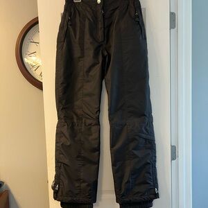 Couloir black ski pants w 2 zippered pockets plus zip pocket below knee size 10